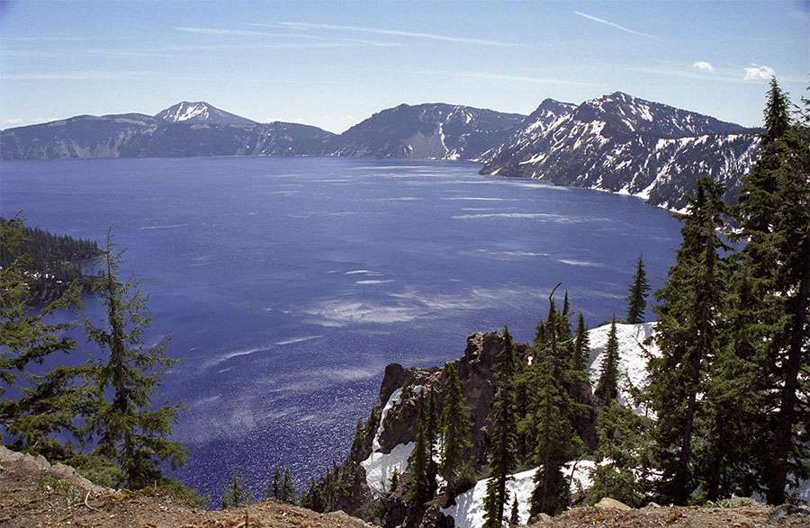 The lake is 1,932 feet at its deepest. The rim averages about 1,500 feet above the lake.
