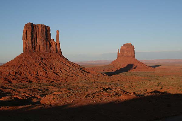 Left Mitten casts a long shadow toward Right Metten late in the day.