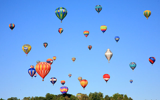 Most balloon "envelopes" are made of nylon or dacron. Near the burners a non-flammable material is used.