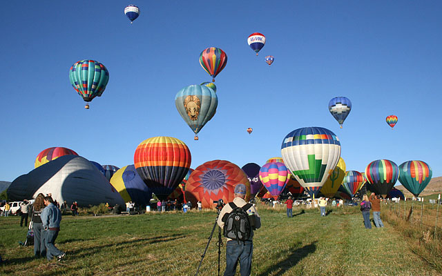 That's Jim with his very heavy backpack full of photo gear. He is capturing the "Mass Ascension Launch" on video tape.