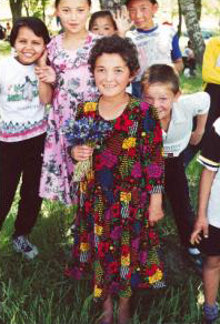 Shy girl with flowers